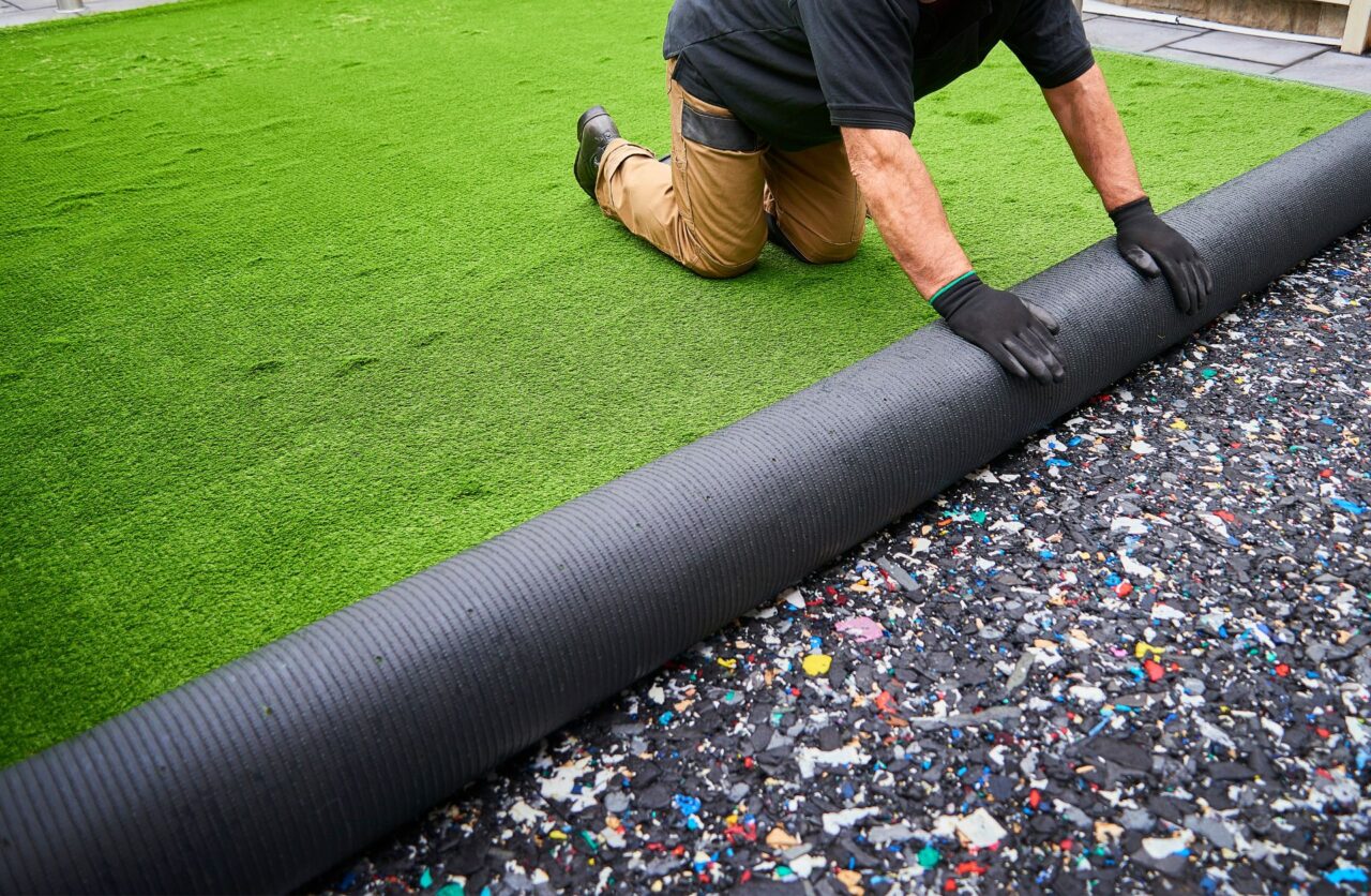 Installing artificial grass in Brampton backyard